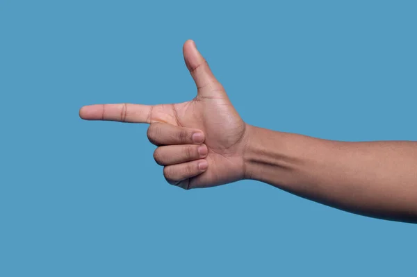 Mano derecha mostrando un gesto de arma de dedo —  Fotos de Stock