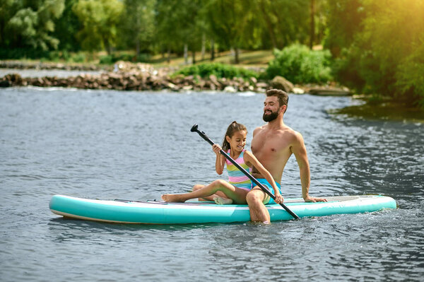 Summer Activity Young Man Blue Shorts Kayaking His Daughter Stock Image