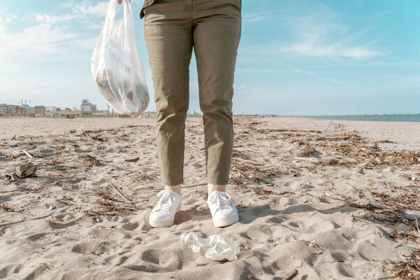 Cropped Photo Volunteer Standing Beach Holding Trash Bag Filled Plastic Royalty Free Stock Photos