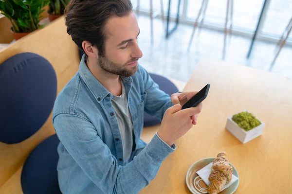 Interest Top View Young Bearded Man Looking Interestedly Screen Smartphone — Stock Photo, Image