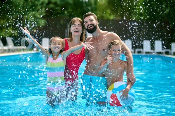 Happy Modern Young Parents Cute Joyous Children Standing Outdoor Swimming — Stock Photo, Image