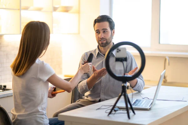 Inteview Famous Person Young Female Journalist Interviewing Bearded Man Looking — ストック写真