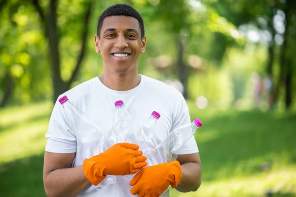 Protection Nature Dark Skinned Guy Gloves Smiling Confidently Camera Holding — Foto Stock
