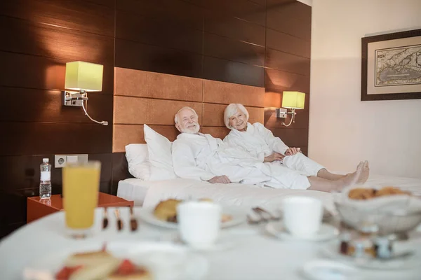 Breakfast Time Senior Couple White Robes Hotel Room Breakfast — Fotografia de Stock