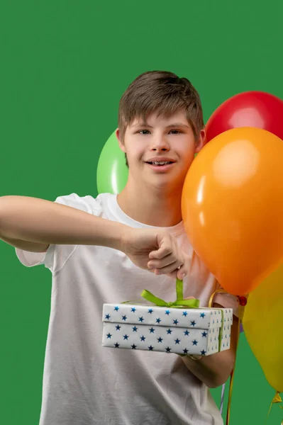 Waist Portrait Pleased Cute Teenage Boy Untying Ribbon Present Box — Stock fotografie