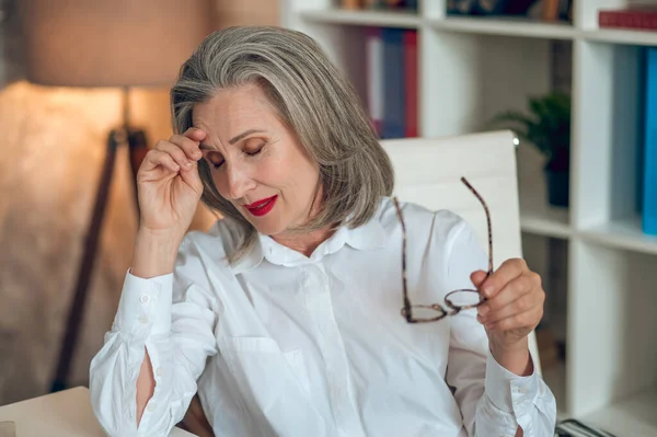 Feeling Bad Mid Aged Businesswoman White Blouse Looking Tired Work —  Fotos de Stock