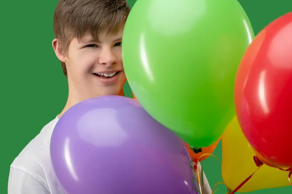 Portrait Smiling Joyful Teenage Boy Bunch Inflated Colorful Party Balloons — Stock Photo, Image