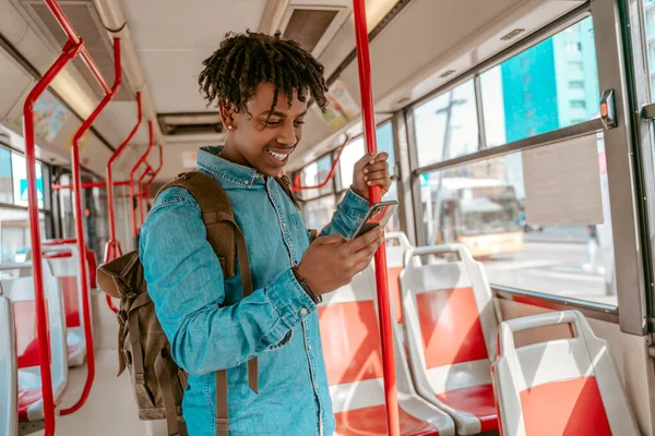 Interesting Here Dark Skinned Joyful Guy Backpack Standing Bus Looking — Stok Foto