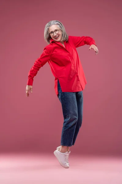 Woman Red Woman Red Shirt Standing Her Toes — Stock Fotó
