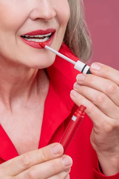 Lip Gloss Good Looking Mature Woman Red Putting Gloss Her — Stok fotoğraf