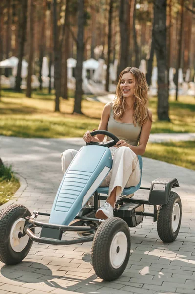 Rush Young Woman Riding Quadrocycle Looking Excited — Stockfoto