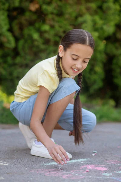 Lucky Drawing Dark Haired Smiling Girl Pigtails Tshirt Breeches Carefully — ストック写真