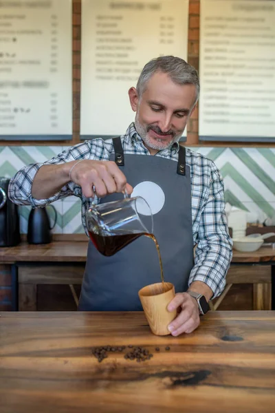 Coffee Time Barista Pouring Coffee Coffee Mug Looking Contented — Zdjęcie stockowe