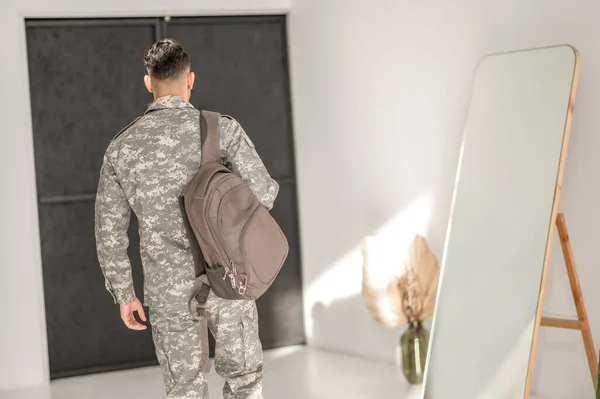 Back View Uniformed Man Backpack Shoulder Walking Entrance Door — 스톡 사진