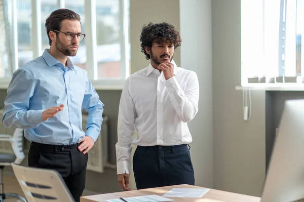 Work Project Two Businessmen Looking Busy While Discussing Project Office — Foto de Stock