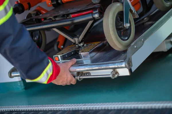 Cropped Photo Paramedic Pulling Out Hospital Gurney Out Medical Emergency — Stock Photo, Image