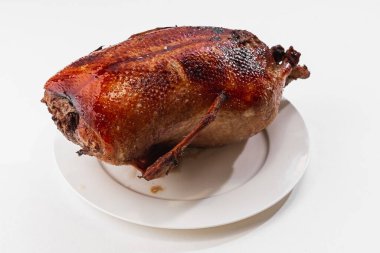 Beyaz arka plan üzerinde ördek kızartma