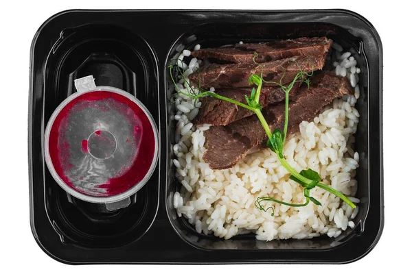 Смачна Їжа Чорній Пластиковій Коробці Білому Тлі — стокове фото