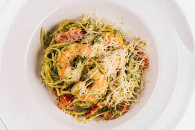 delicious spaghetti with shrimps and vegetables