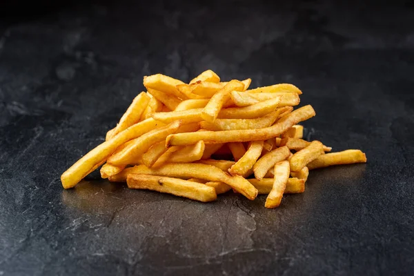 Primer Plano Papas Fritas Sobre Fondo Negro —  Fotos de Stock