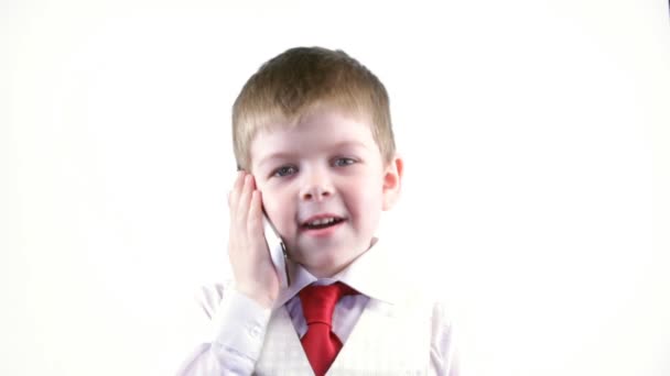 Το αγόρι μιλάει στο τηλέφωνο. — Αρχείο Βίντεο