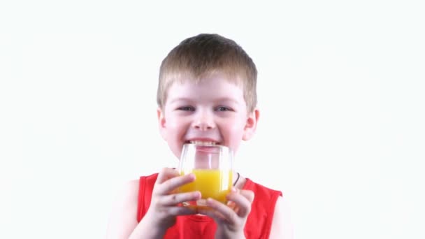 Boy drinking juice — Stock Video