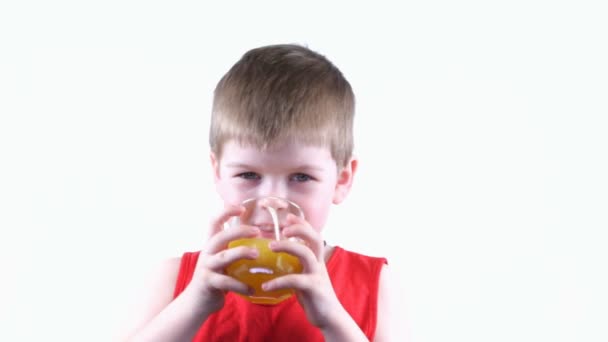 Boy drinking juice — Stock Video