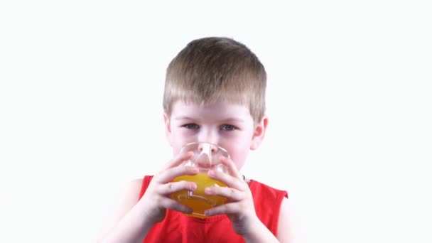 Boy drinking juice — Stock Video