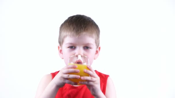 Boy drinking juice — Stock Video