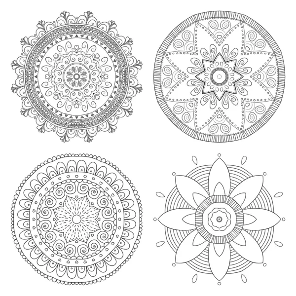 Set of vector flower ornaments — Stock Vector