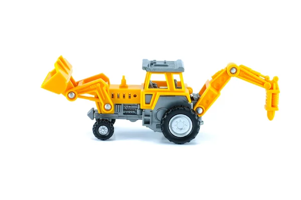 Tractor toy in yellow color — Stock Photo, Image