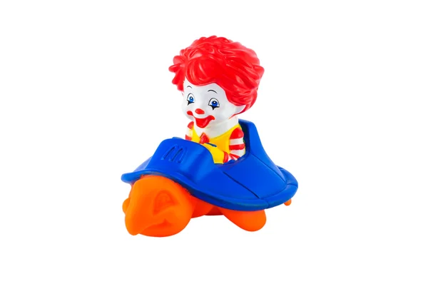 Toddler Ronalds riding an orange Turtle — Stock Photo, Image