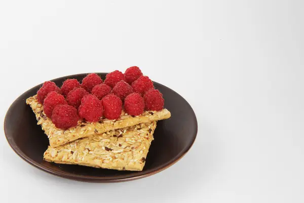 Delicious toast with raspberries on table close-up , health food — Stock Photo, Image