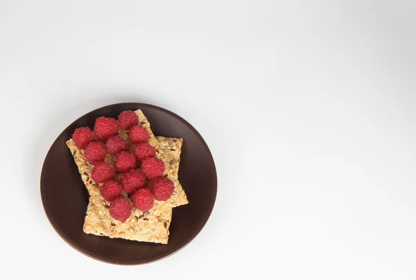 Delicious toast with raspberries on table close-up , health food — Stock Photo, Image