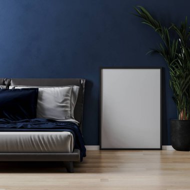 Çerçeve, yatağın yanındaki ahşap zeminde maket yapıyor ve modern yatak odasının içini mavi duvarla donatıyor.