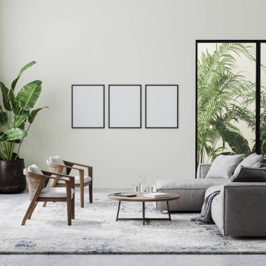 Modern oturma odasının iç kısımlarında bej duvar, gri ve ahşap mobilyalar ve palmiye yapraklı tropikal bitkiler var.