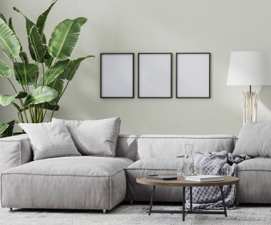 Modern odadaki boş poster çerçeveleri gri kanepe ve kahve masası ve tropikal bitki, 3D görüntüleme