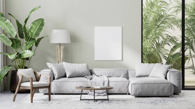 Boş tuval modern oturma odasında gri kanepe, ahşap mobilya ve palmiye yaprakları ile modellenir.
