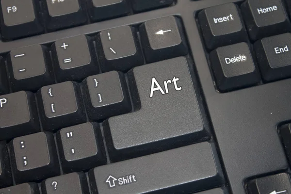 Black Computer Keyboard with Art text. Close-up of an electronic Computer Device part, keypad.