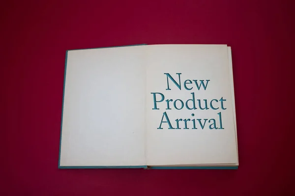 New Product Arrival word in opened book with vintage, natural patterns old antique paper design.