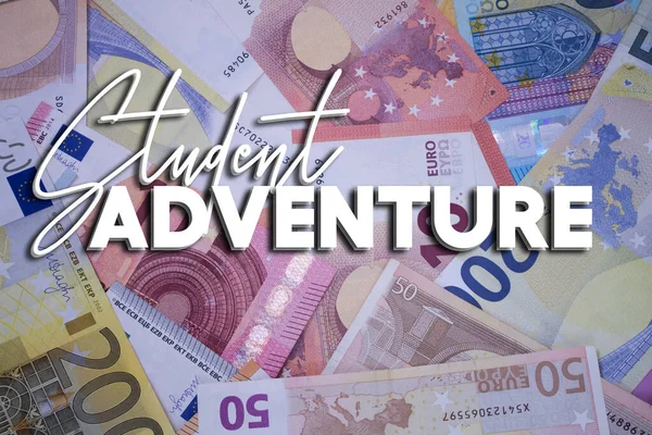 Student Adventure word with money. Paper currency background with different banknotes.