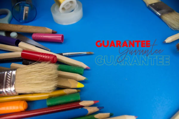 Overhead Shot School Supplies Guarantee Text Brushes Pencils Artistic Tools — 스톡 사진