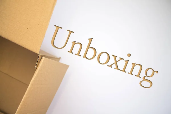 Unboxing Palavra Com Caixa Papelão Caixa Cartão Dobrado Marrom — Fotografia de Stock