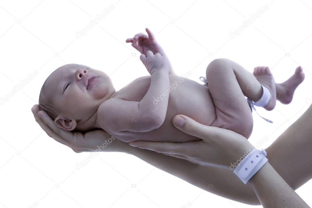 Newborn in his mother's hands