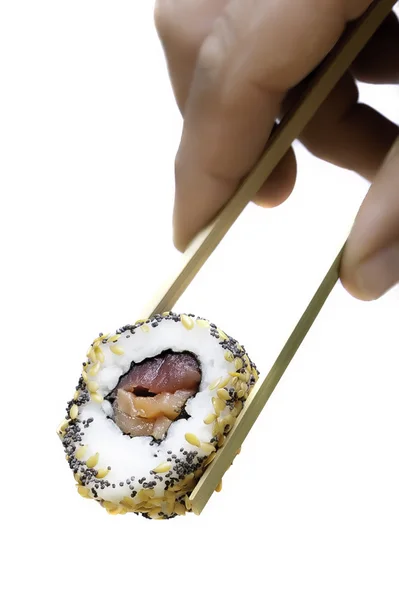 Closeup holding sushi — Stock Photo, Image