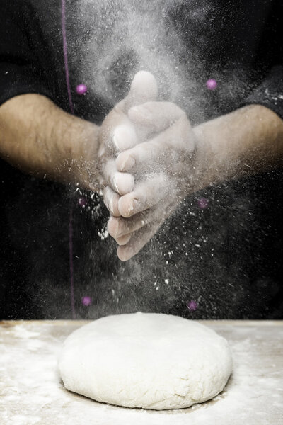 hands with flour