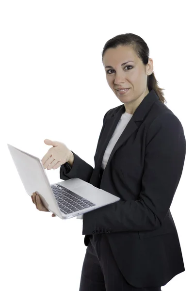 Business woman presenting a laptop — Stock Photo, Image