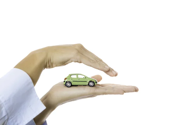 Hand hält ein Spielzeugauto — Stockfoto