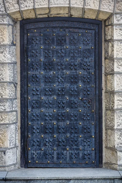 Текстура каменной стены и старинная дверь Лицензионные Стоковые Фото