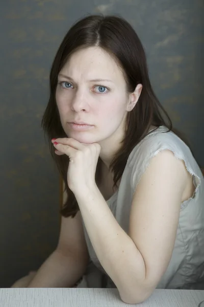 Serious young brunet woman — Stock Photo, Image